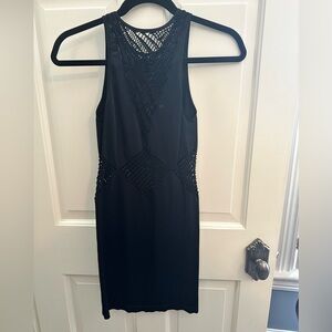 Black bodycon dress with eyelet designs